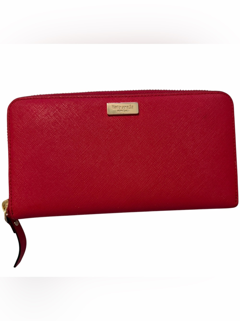 Kate Spade Laurel Way Neda zip around continental wallet with gold hardware.